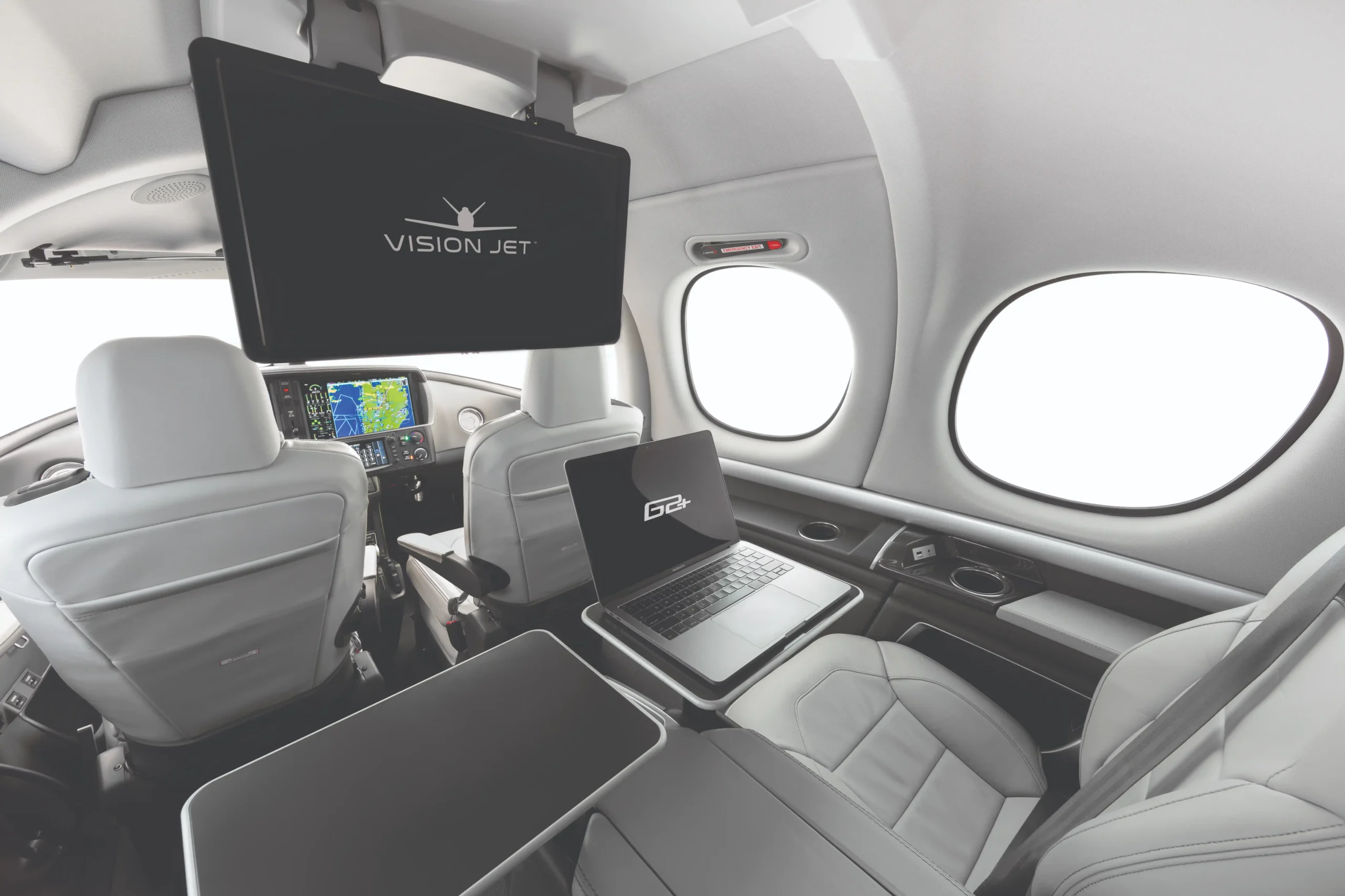The interior of a VisionJet showcasing the amenities of the aircraft